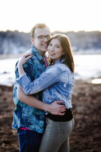 engaged couple hugging