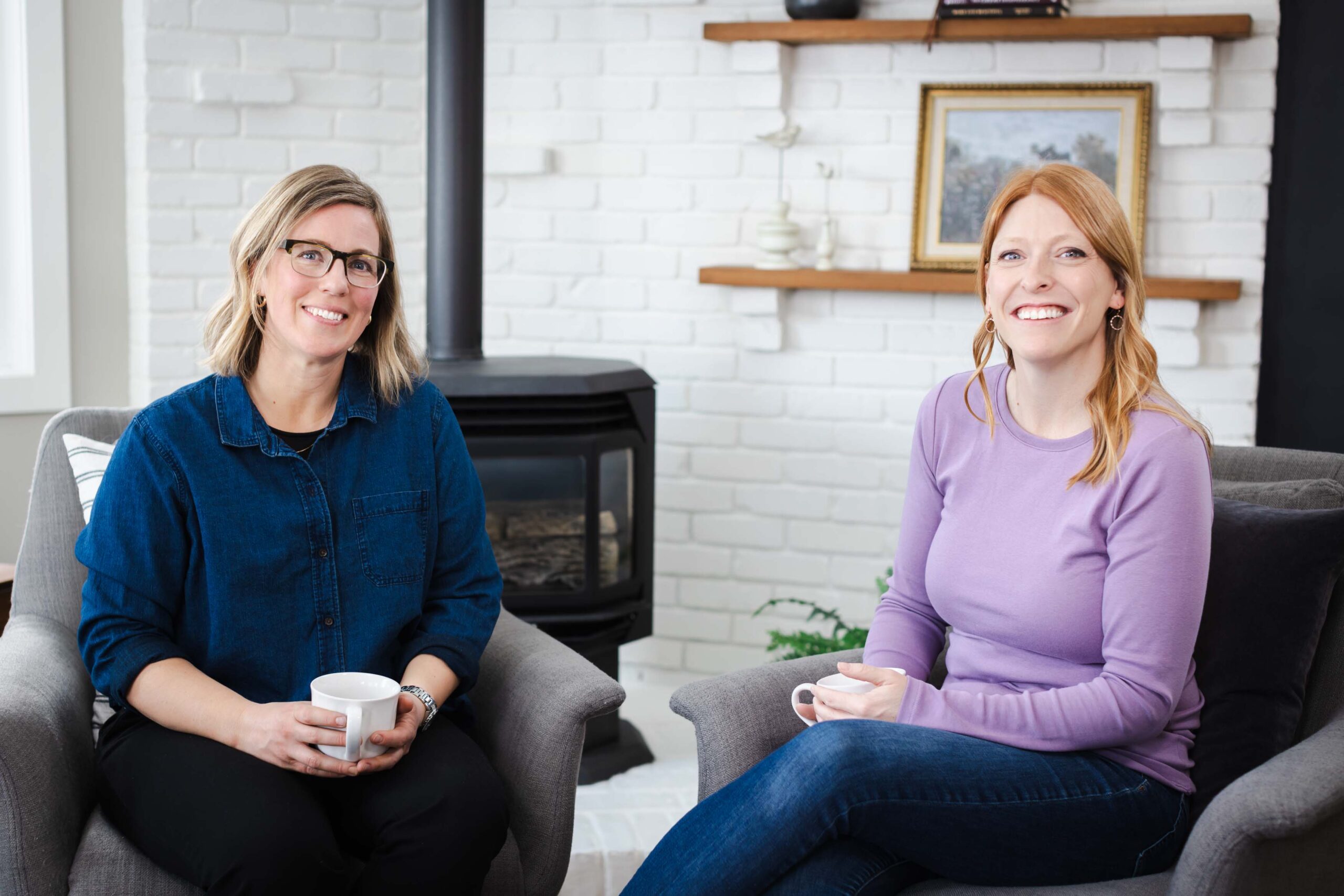 two female business owners chatting over coffee