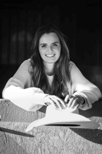 portrait of a cowgirl in her barn personalized Calgary grad photo session
