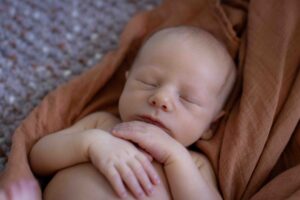 newborn baby sleeping peacefully
