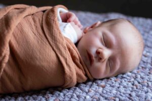 at home newborn photography session Calgary baby sleeping