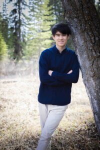 teenage boy posing for picture in Griffith Woods park