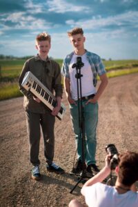 high school musicians on a dirt road calgary personalized grad photoshoot
