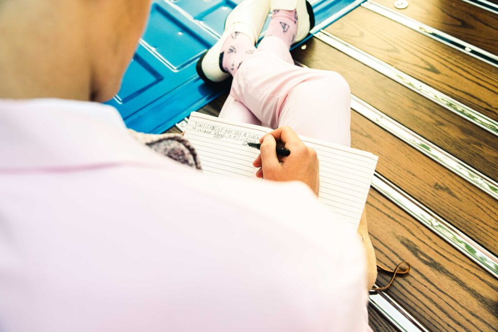 Calgary singer songwriter with lyric notebook
