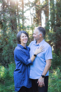 beautiful married couple posing for photograph in Griffith woods Calgary family photographer