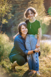 mother and daughter posing for photograph in Griffith Woods Calgary family photographer