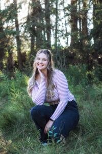 young adult woman in Griffith woods portrait calgary family photographer